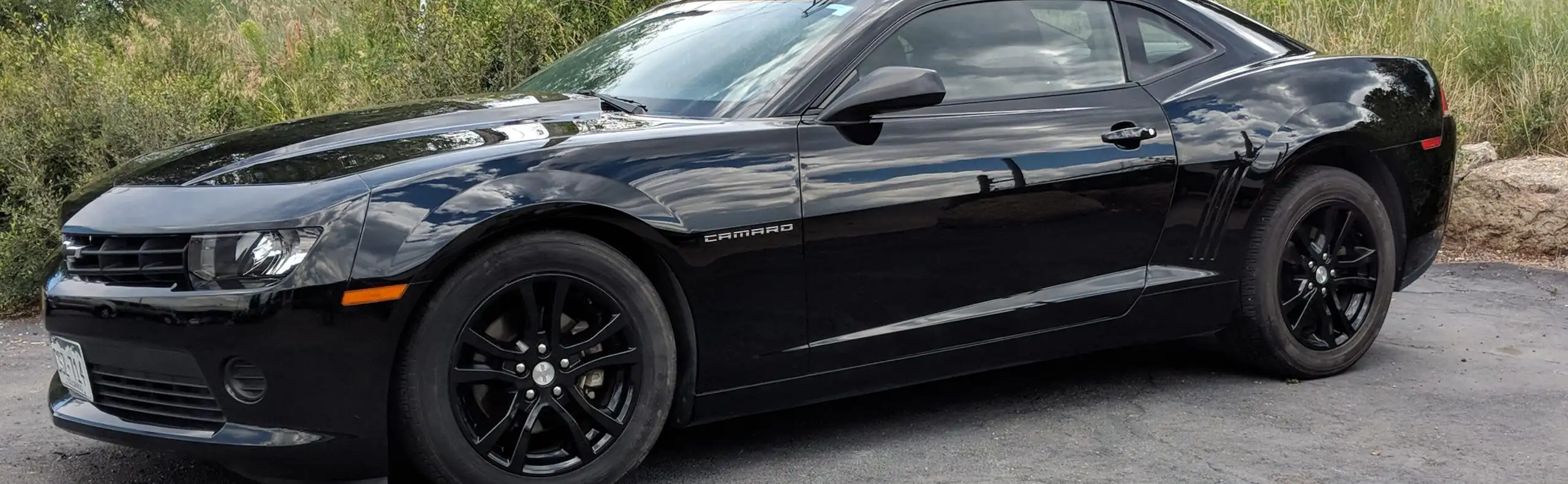Paint Correction on Black Camaro Featured Image