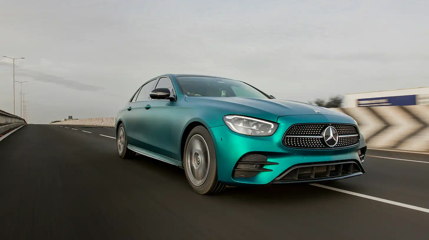 Benz with Teal Blue PPF on Highway