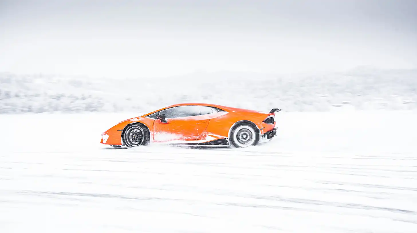 Exotic Car in Snow with Color PPF Wrap